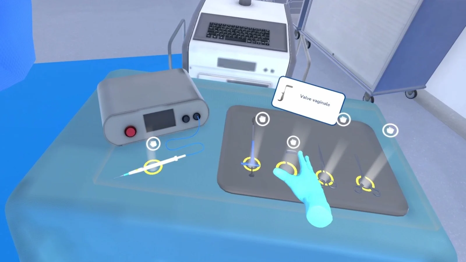 Table d'instruments de la simulation en réalité virtuelle : le praticien choisit son matériel avant d'aborder le geste.
